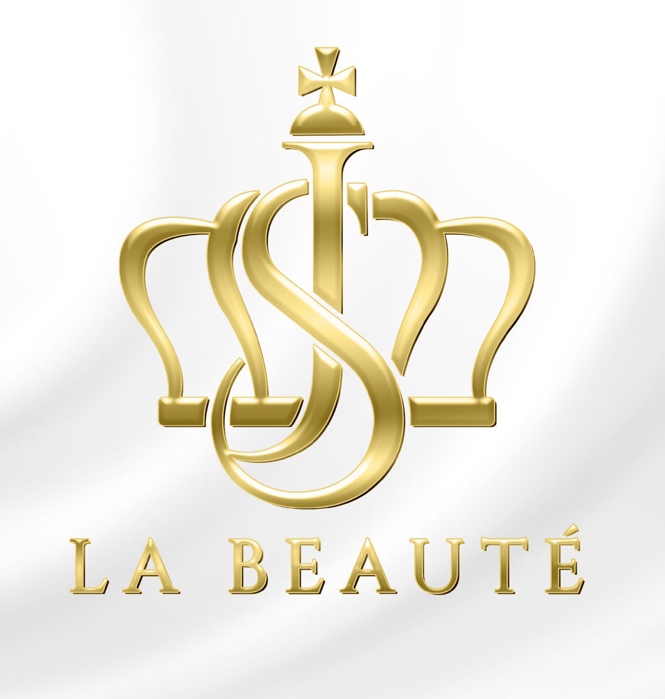 Logo JS LA BEAUTÈ aus Gold mit weißen tuch Hintergrund